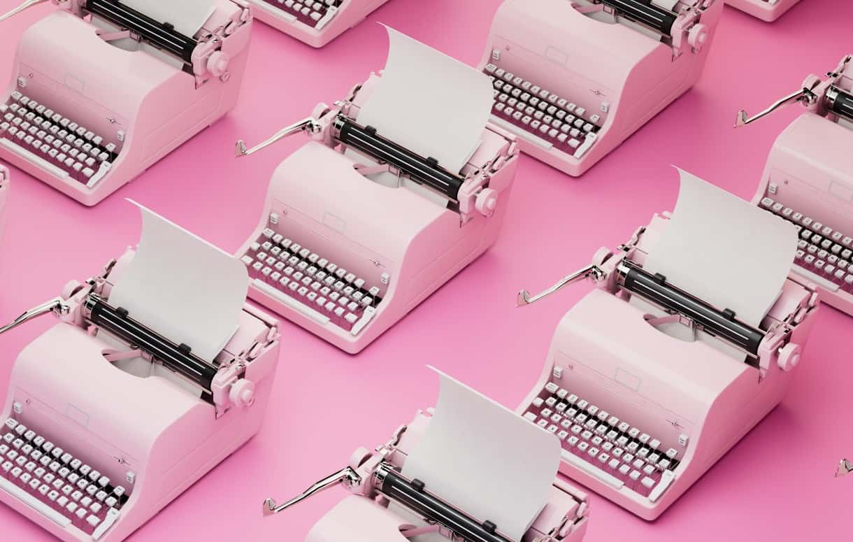 Lolly Agency Sherborne pink typewriters on a pink background