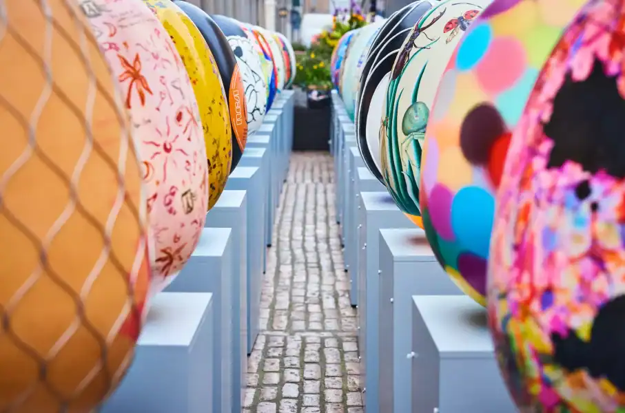 Colourful decorated eggs for event display.