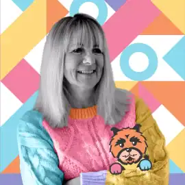 Lolly Agency team member smiling with colourful background.