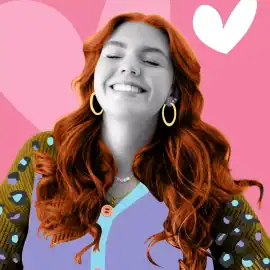 Smiling woman with red hair and colorful outfit, representing Lolly Agency team.