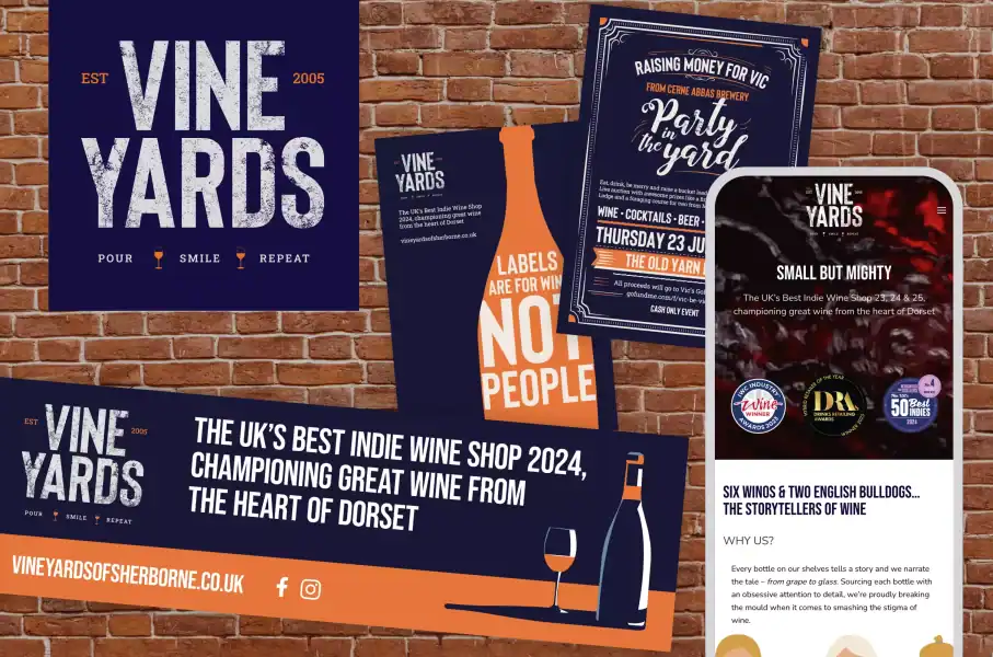 Branding display for Vine Yards wine shop with promotional posters and banners.